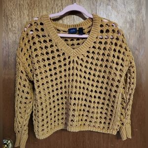 Holey mustard sweater